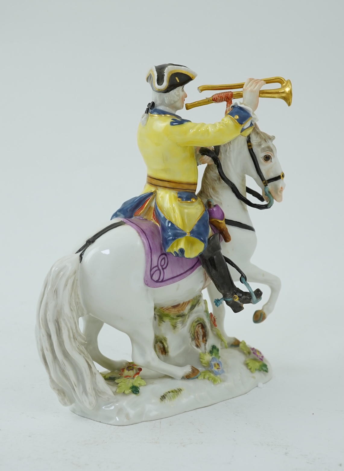 A Meissen group of a bugler on horseback, early 20th century